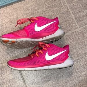 Bright pink Nike Free Run’s